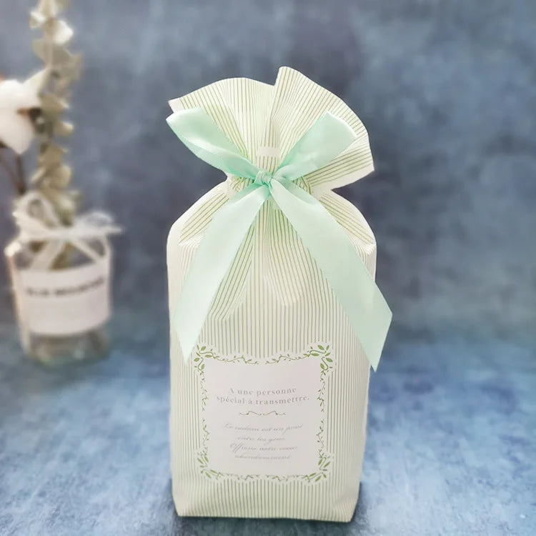 50 PCS/100 PCS Christmas gift bag holiday decoration bag candy cookie snack bag for packaging food drawstring bundle pocket